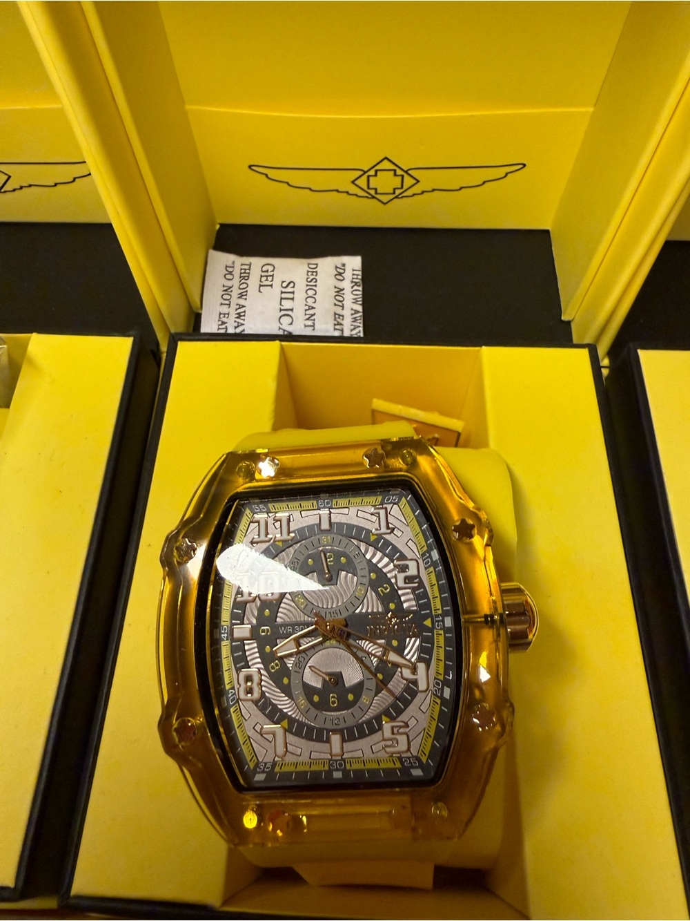 Invicta Yellow Transparent Case Men's Watch with Black and Silver Dial